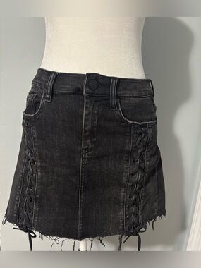 Blank NYC Black Lace-Up Denim Mini Skirt with Frayed Hem